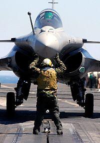 French Navy's Rafale multirole fighter aircraft on deck with shooter