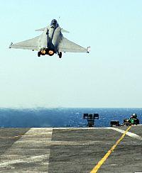 French Navy RAFALE fighter aircraft takeoff from a carrier aircraft deck